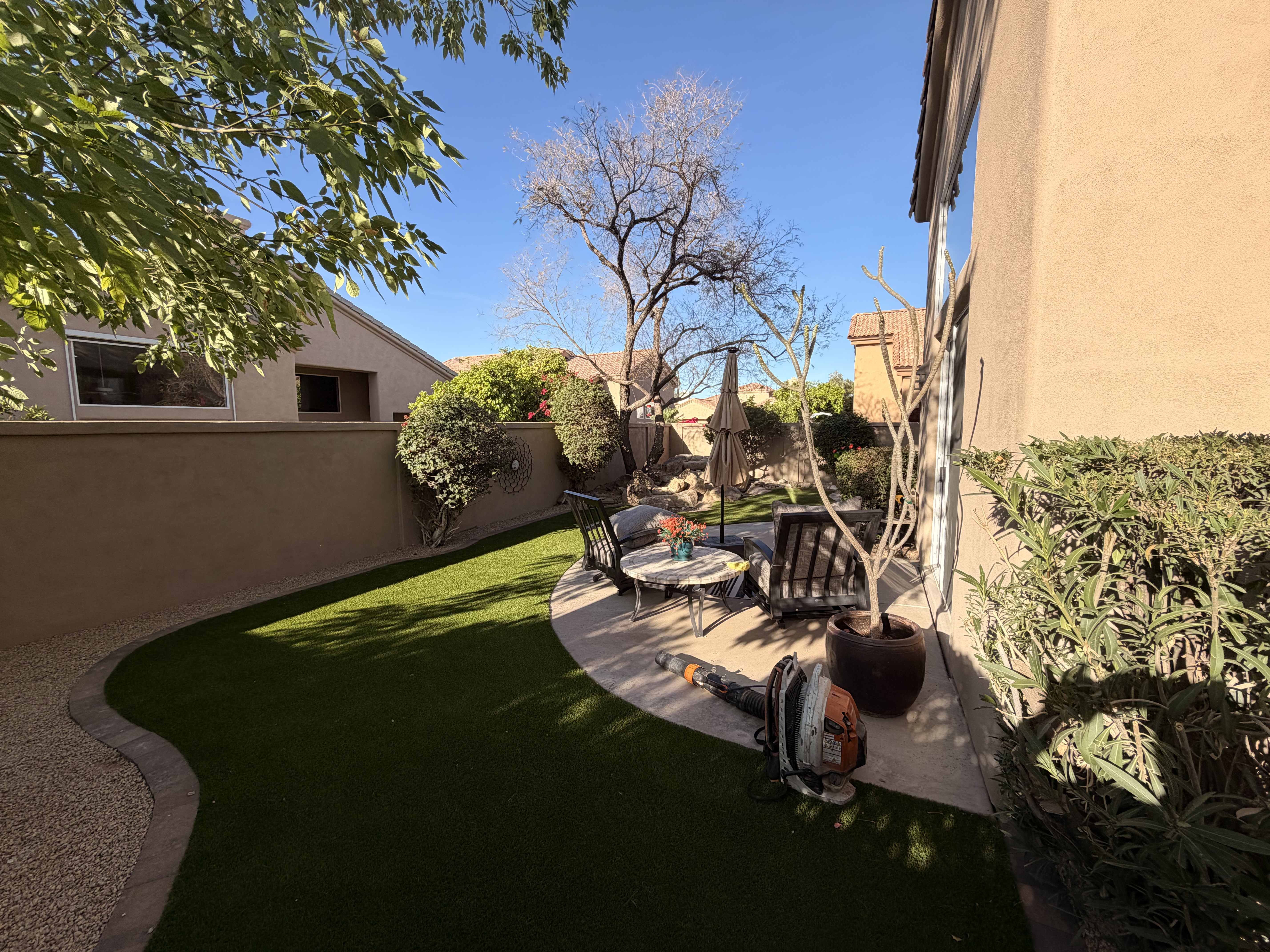 Backyard landscaping and patio maintenance